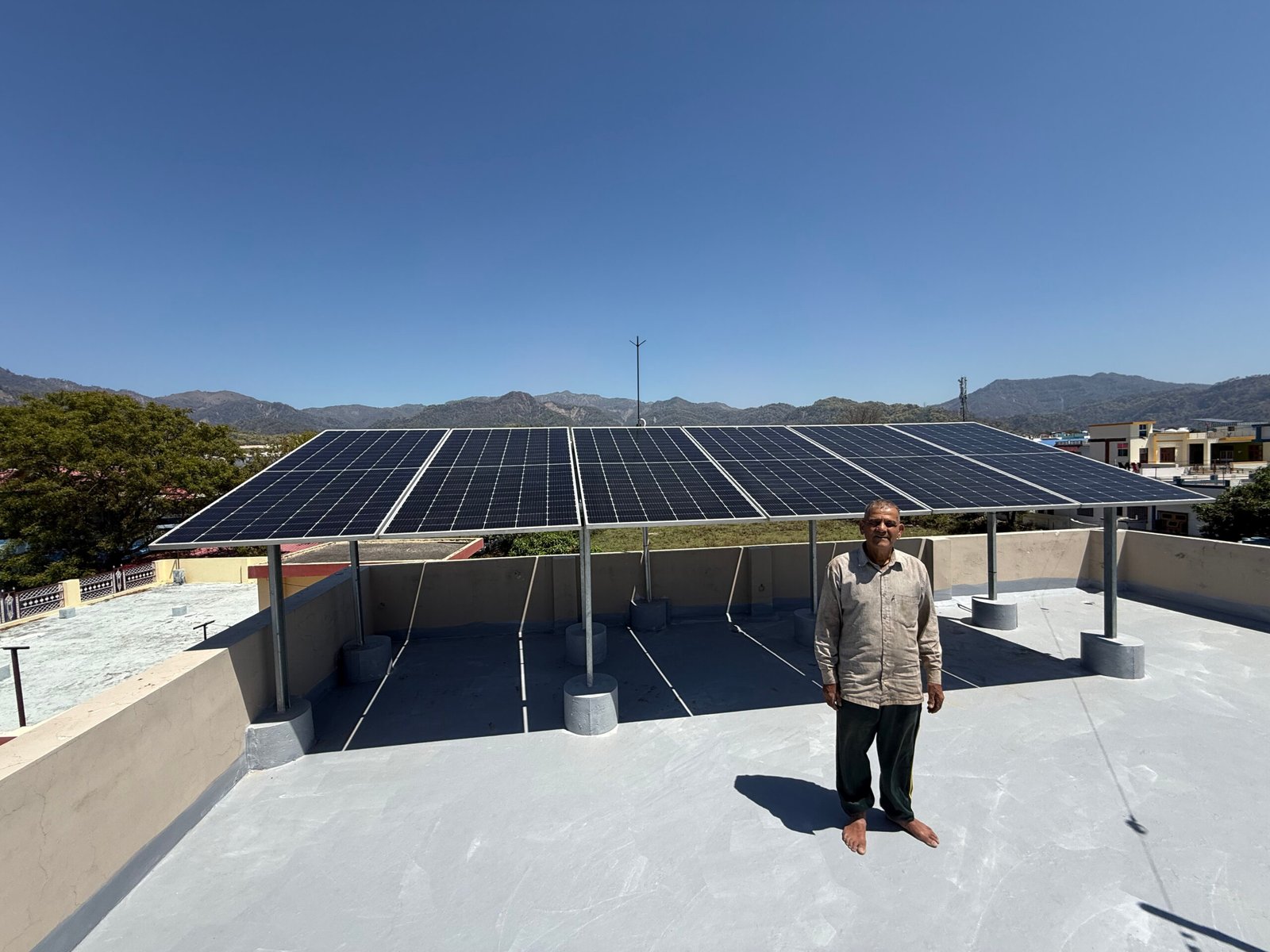 Uttara Electronics solar installation team working on rooftop solar project in Uttarakhand